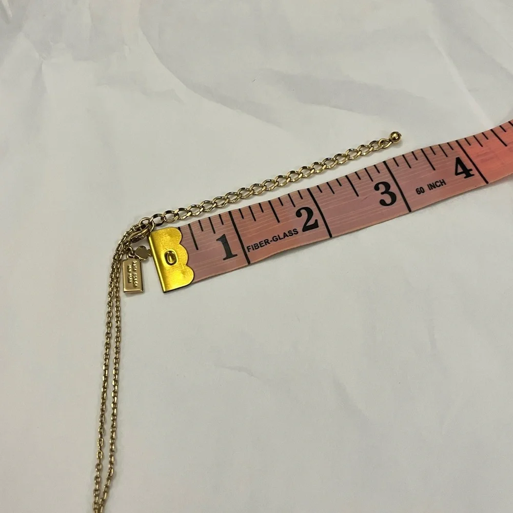 Kate Spade New York Gold-Tone Born To Be Wise One Cream Pendant Necklace
